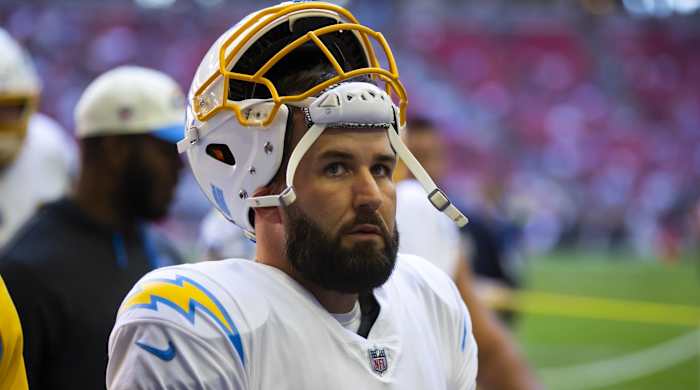 Chargers quarterback Chase Daniel looks up while on the sidelines during a game.